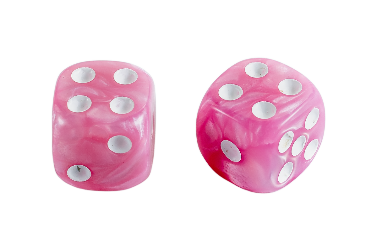 Two pink marbled acrylic dice on a solid white background